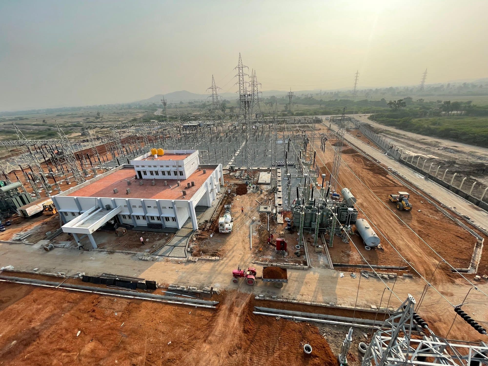 A sub-station under construction from the air, the control building in front