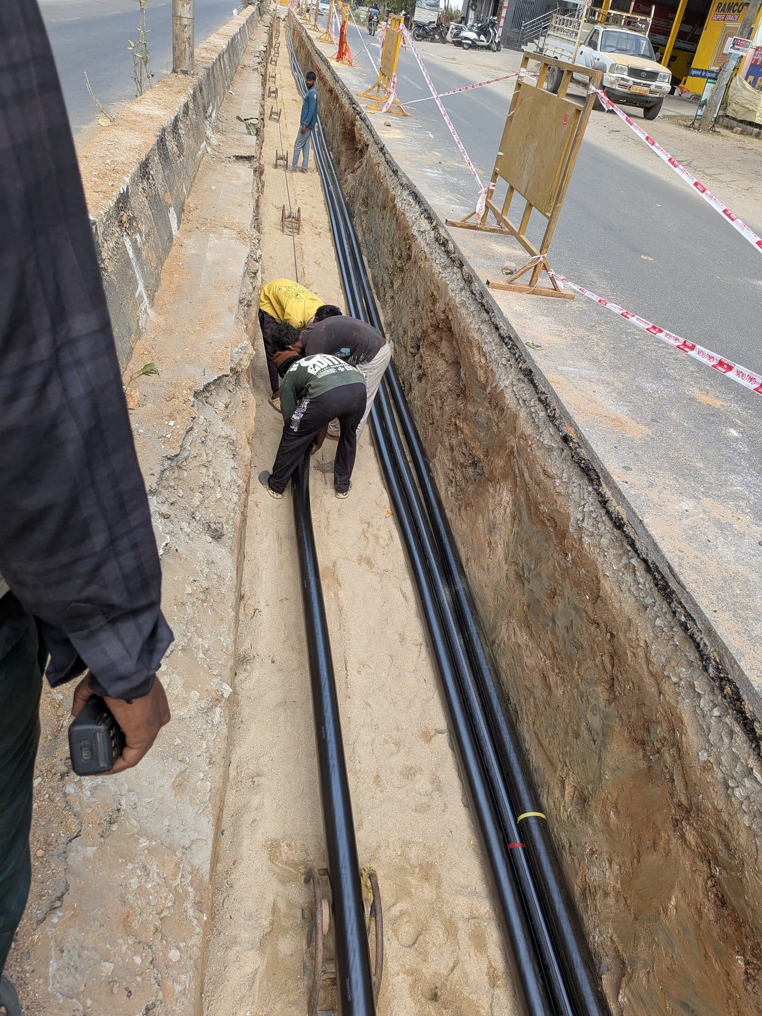Laying cable in the roadside trench