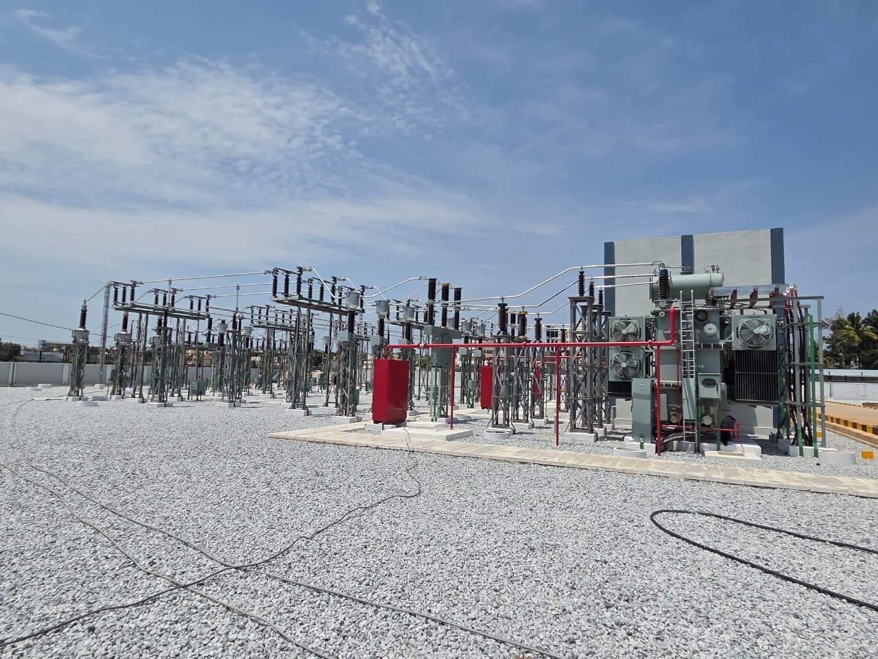 A transformer bay and the 66 kV bays, with fire-protection piping
