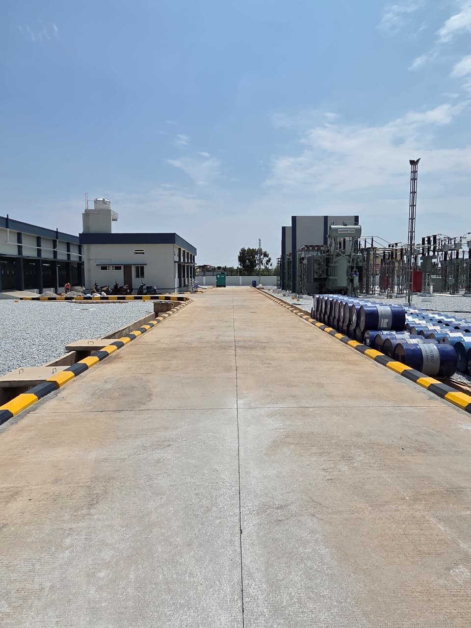 The internal road, oil drums and the control building