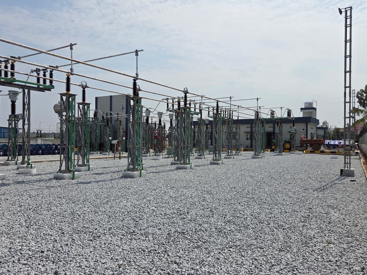 Bays across the yard, the control building beyond
