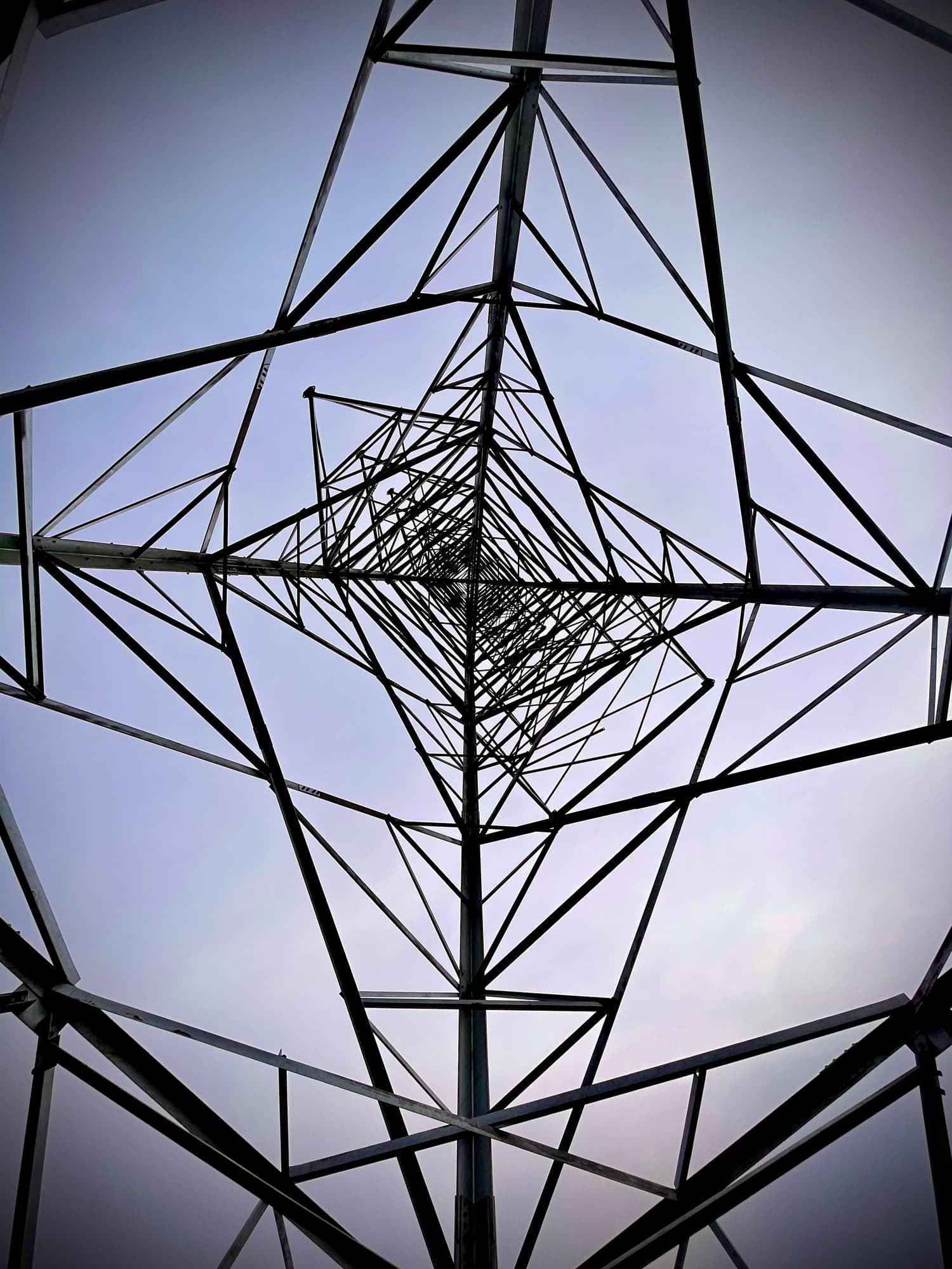The lattice of a tower seen from directly beneath