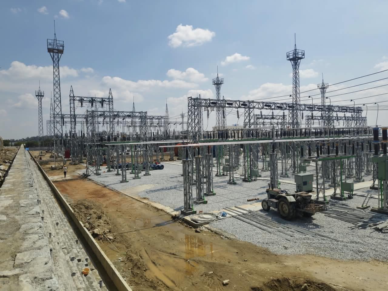 The drain at the yard's edge being formed, the switchyard beyond