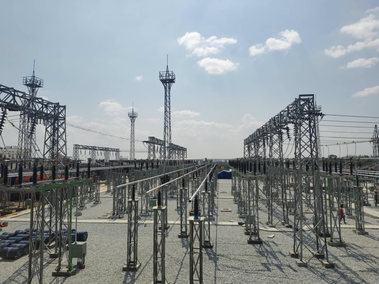 Rows of bays and gantries under the lighting masts