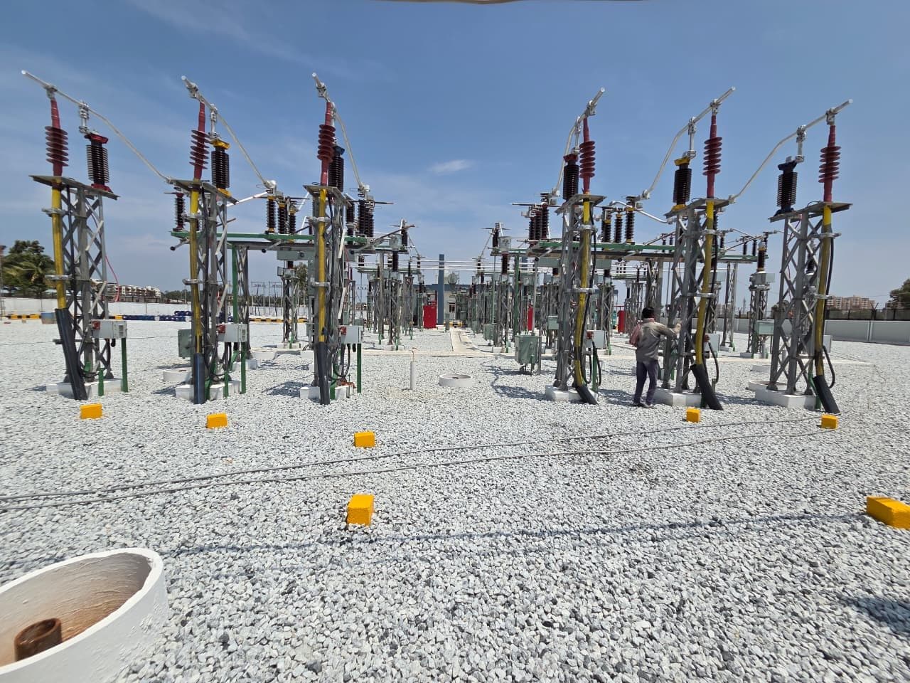 An engineer at a 66 kV bay during commissioning